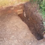 Hole dug ready for engineering brick foundations