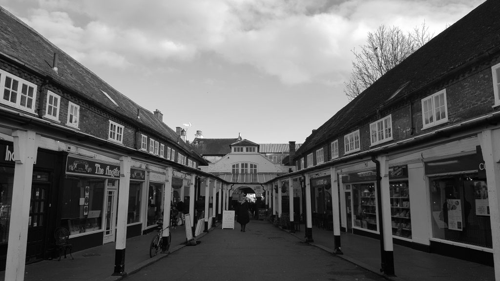 Narrow shop arcade with tiny windows